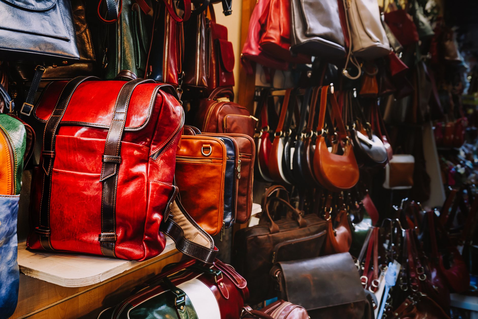 A small handbag standing upright on a table.